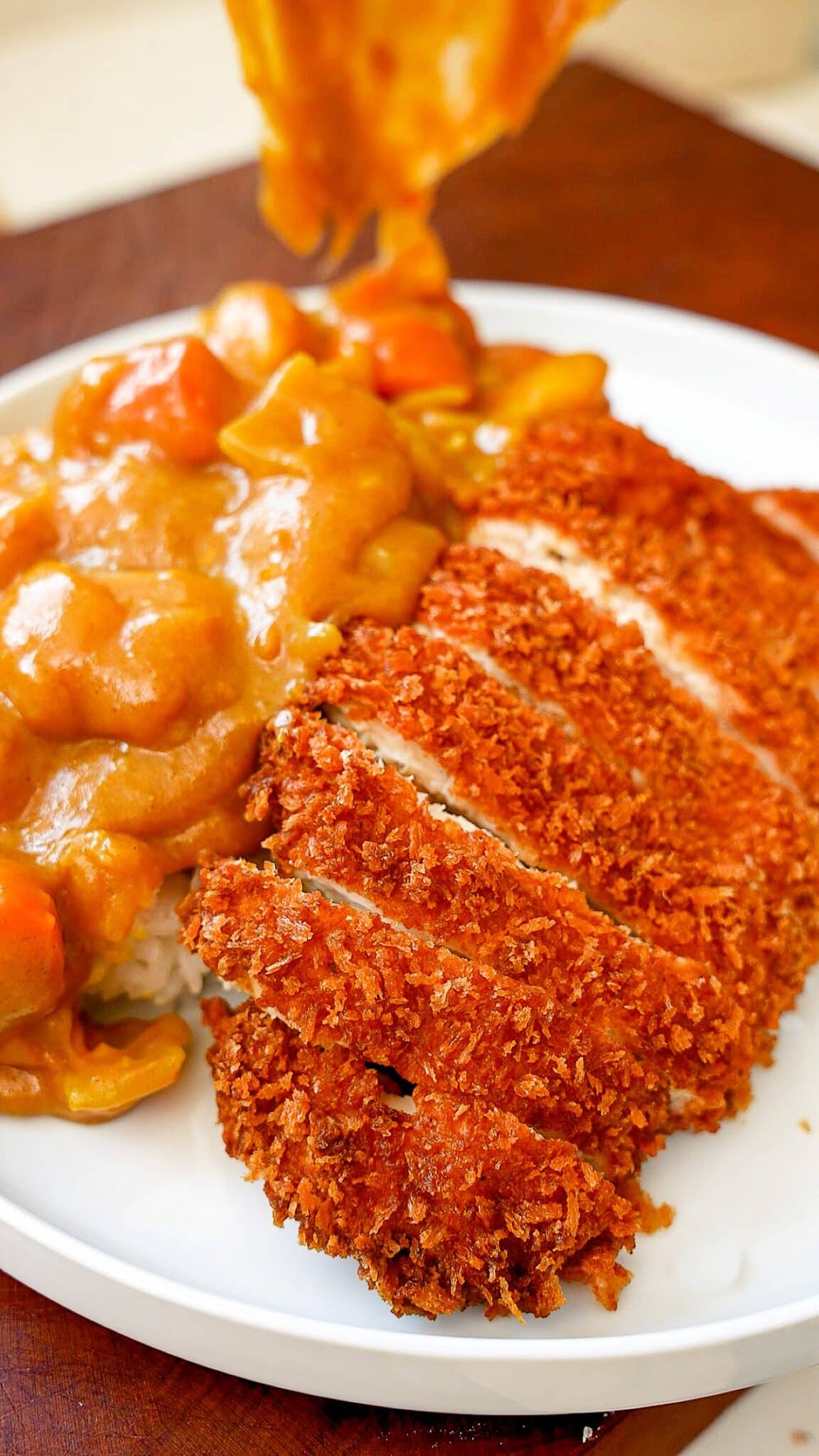Chicken Katsu Curry on a white plate.