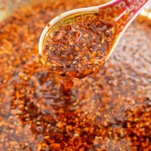 Chinese Chili oil in a bowl with a spoon.