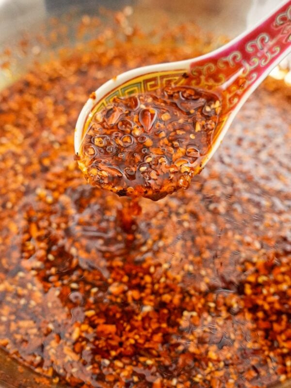 Chinese Chili oil in a bowl with a spoon.