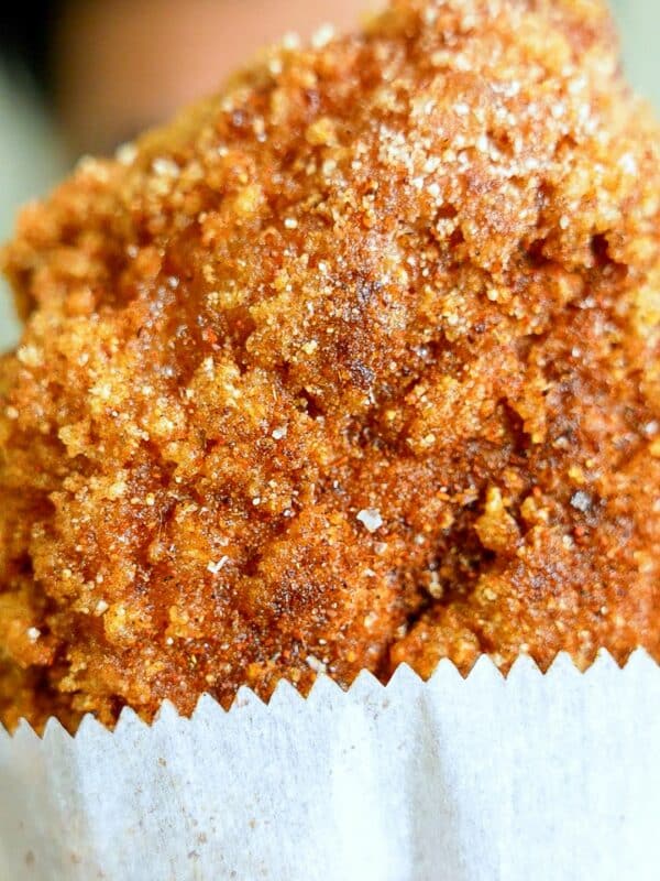 A Taiwanese XXL fried chicken cutlet in a white paper wrapper.