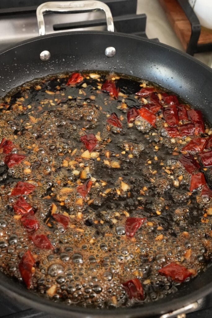 Mixing sauce in a pan