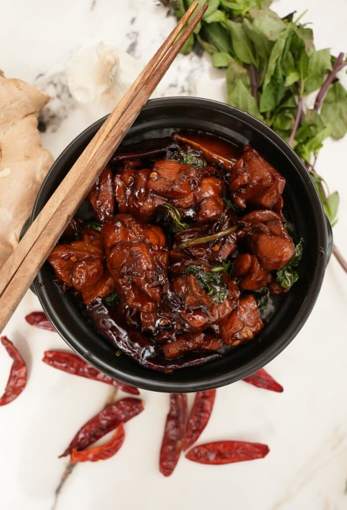 Three cup chicken in a clay pot.