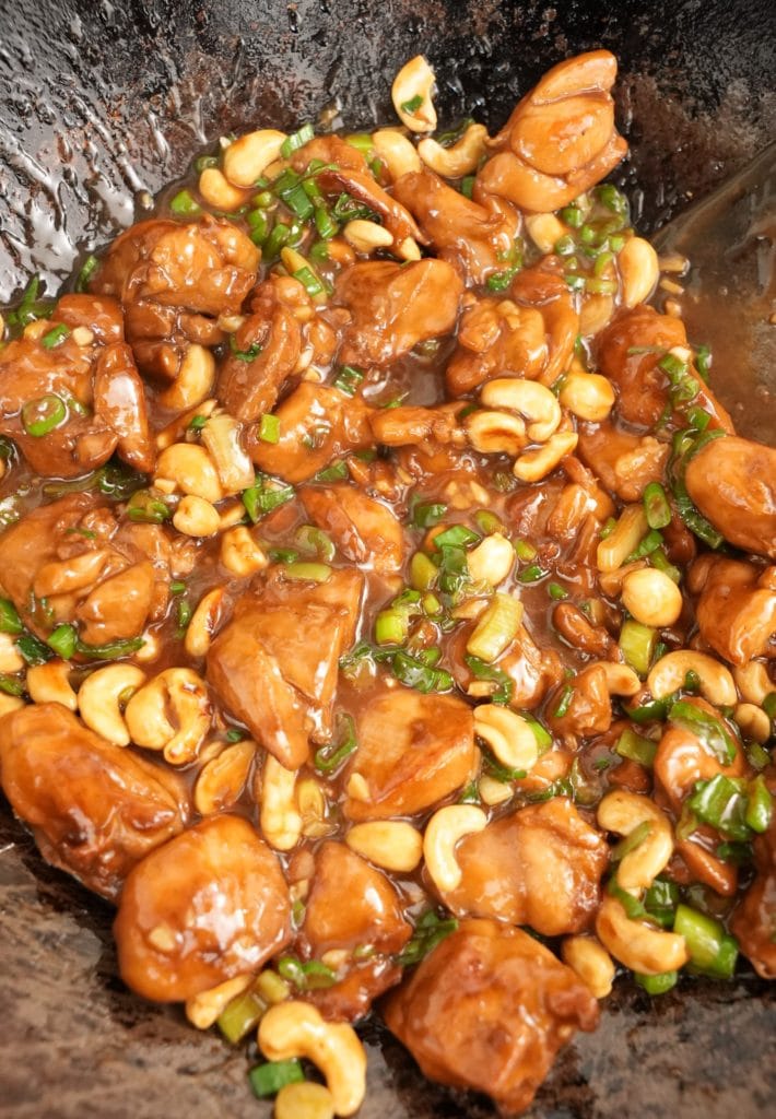 Cashew chicken cooked in a pan