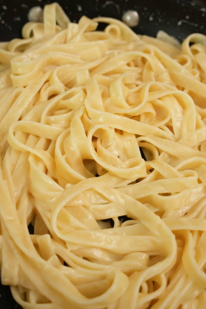 Fettuccine Alfredo in a pan.