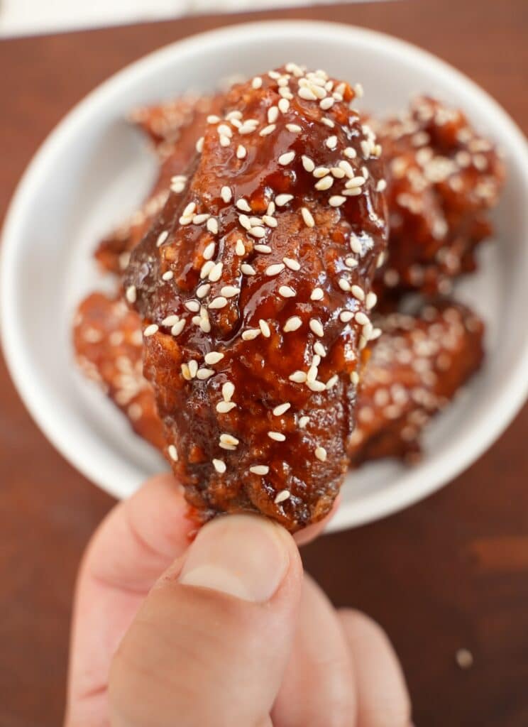 Gochujang Honey wings held close up