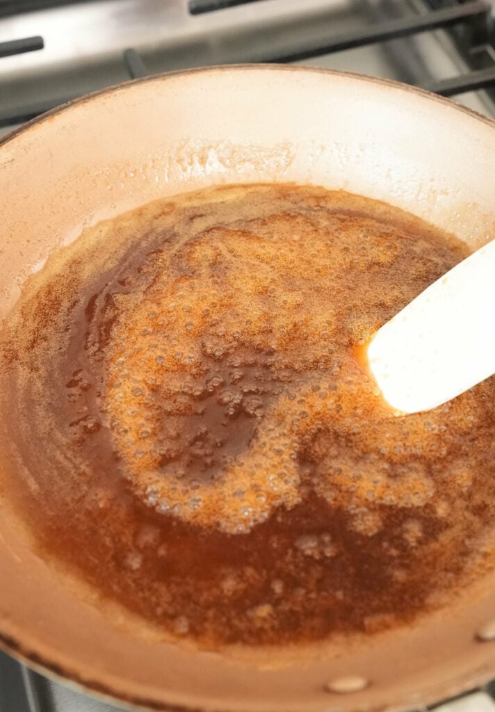 honey butter sauce cooking in pan
