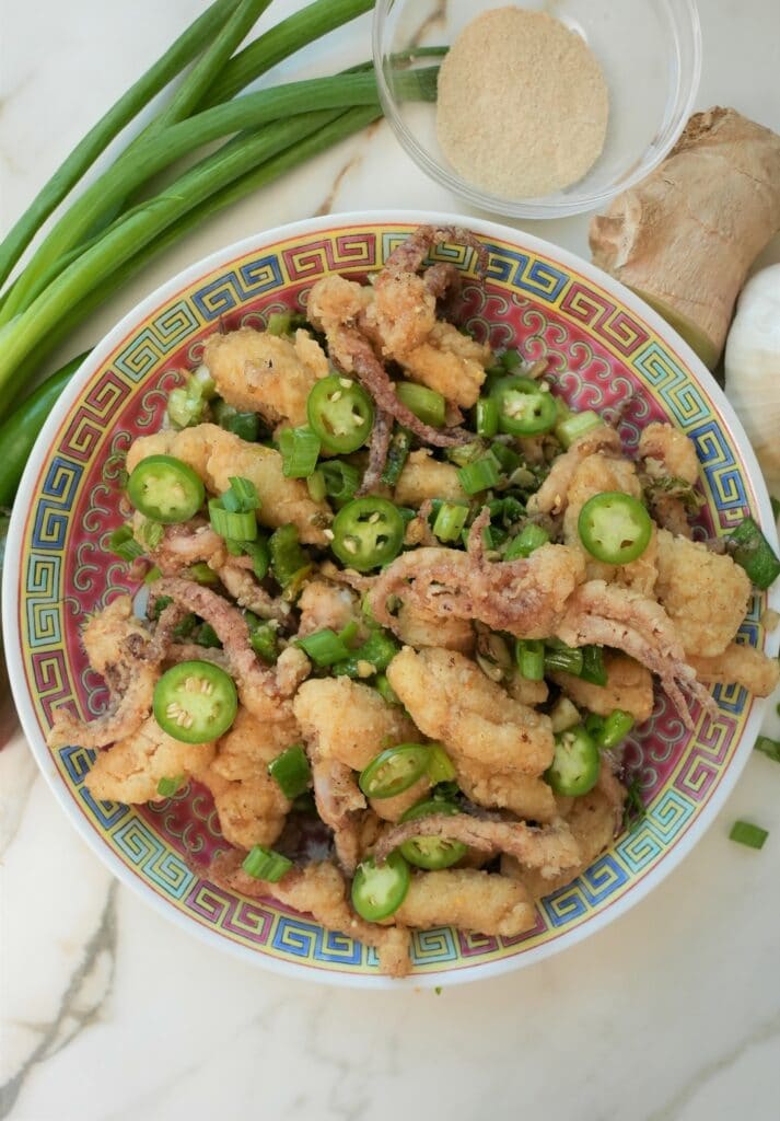 Salt and pepper squid on a plate.