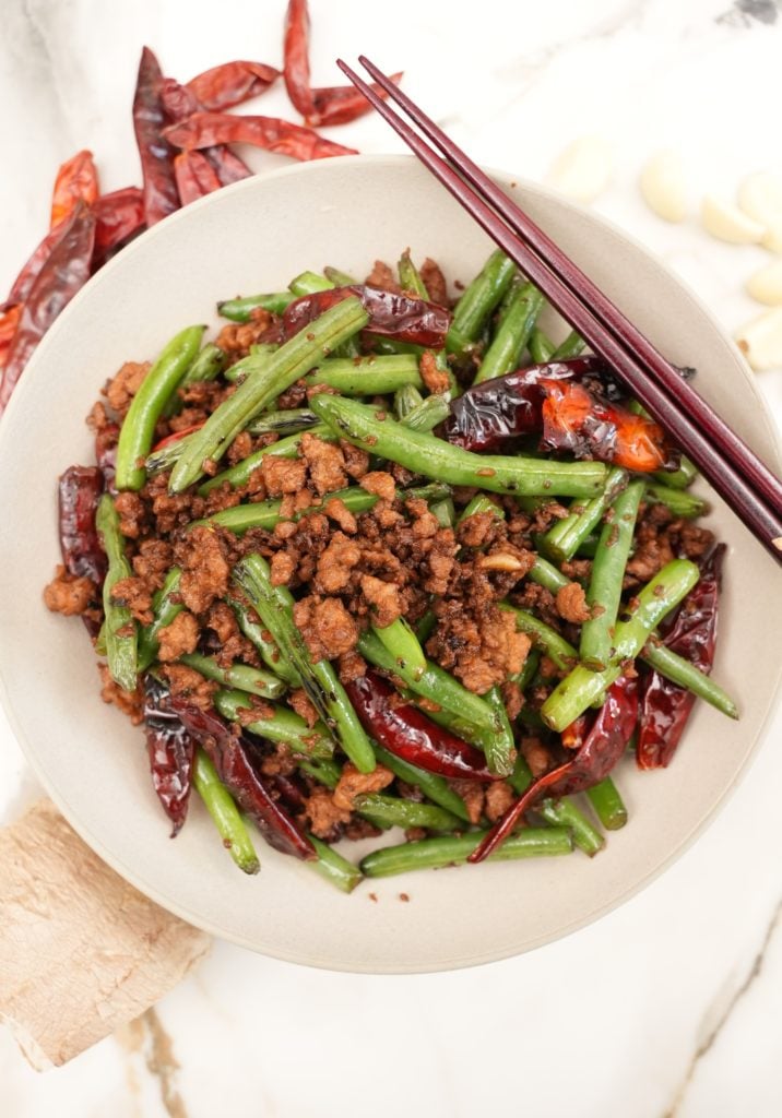 Close-up of chinese green beans with pork in a bowl