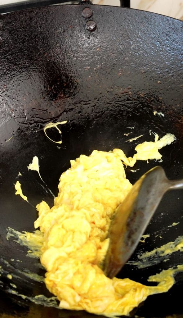 Scrambled egg in a wok.