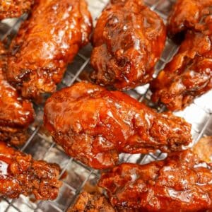 Crispy Honey Sriracha Wings on a wire rack.