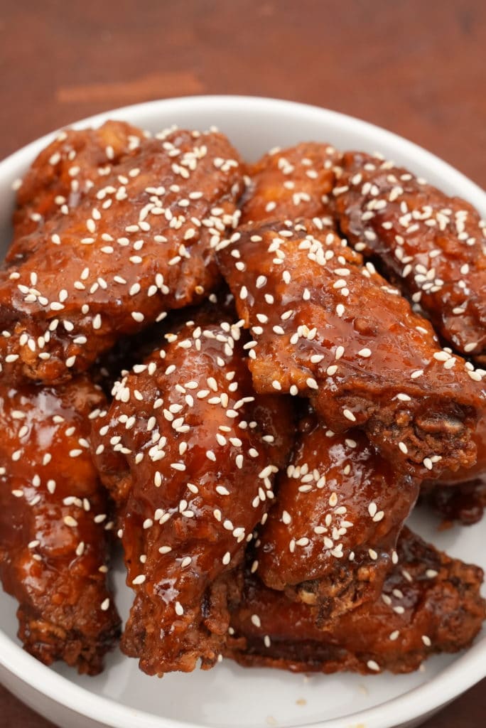 Honey Sriracha chicken wings on a plate