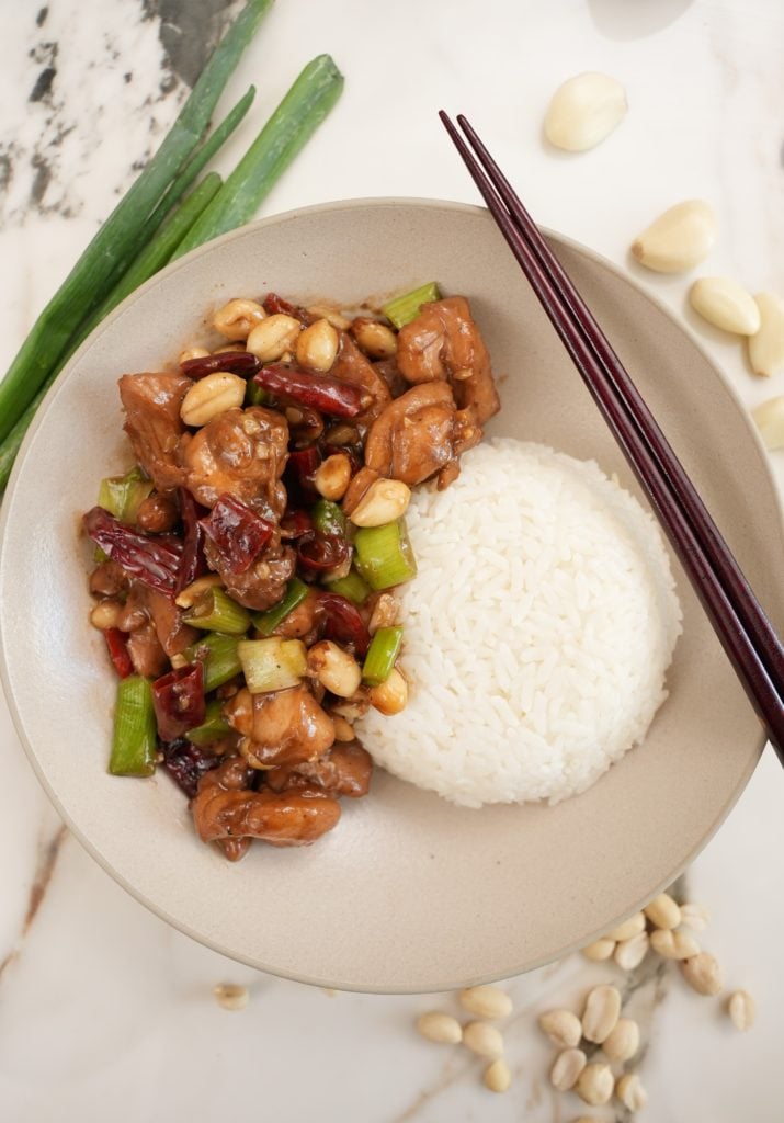 Kung Pao Chicken in a bowl with rice.