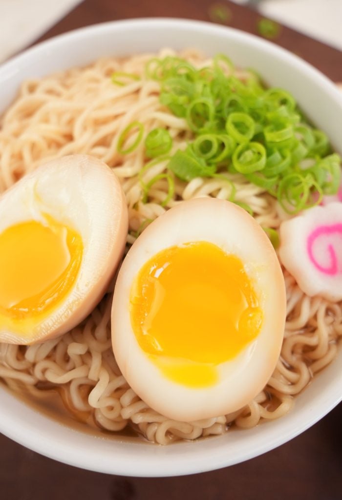 close up of ramen eggs cut in half