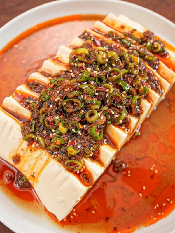 Chinese Silken Tofu on a plate with sauce.