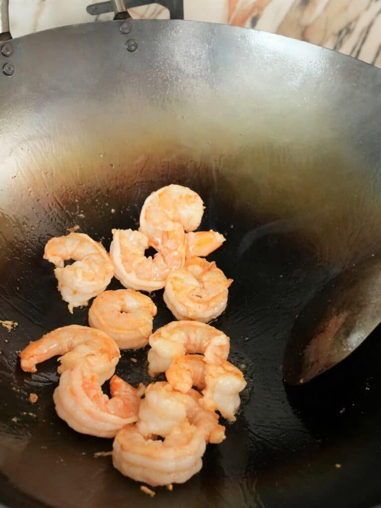 shrimp cooking in a wok