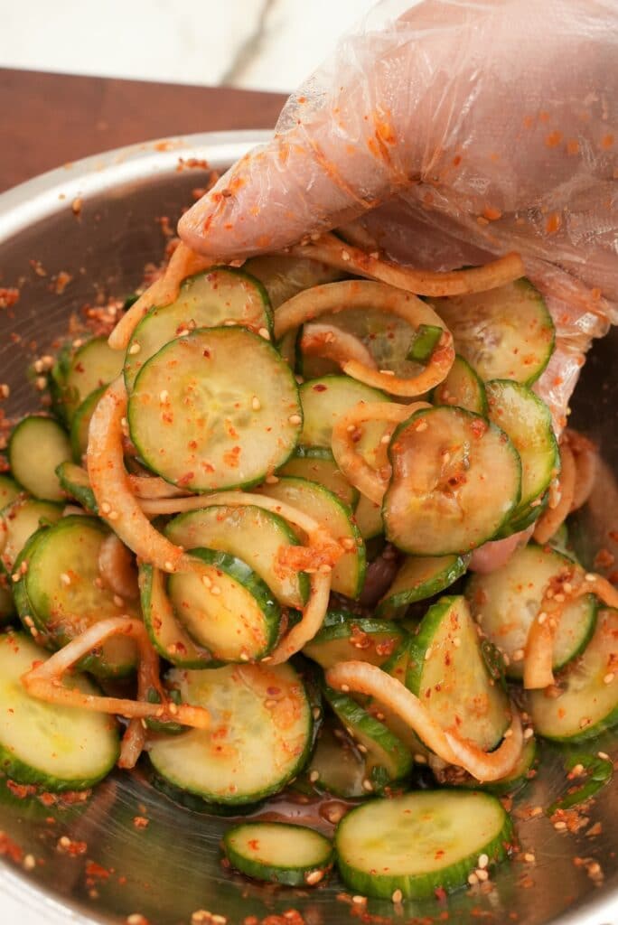 Korean Cucumber salad mixed in a bowl