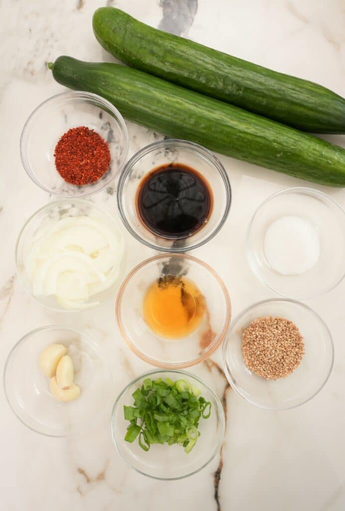 Korean Cucumber Salad ingredients in small bowls