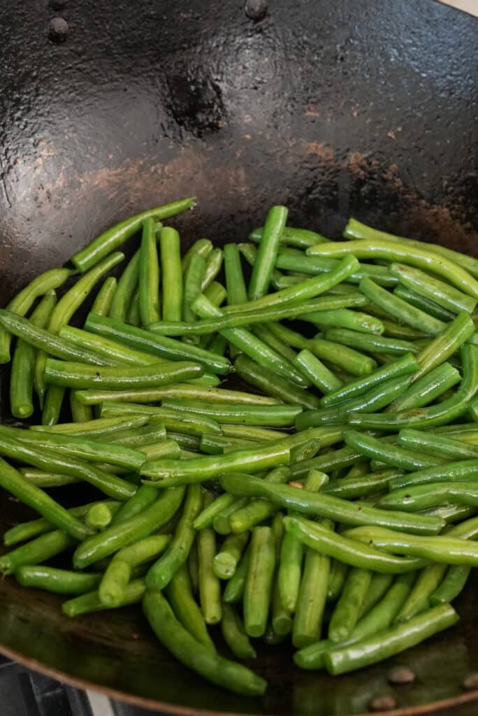String Beans cooking in a wok