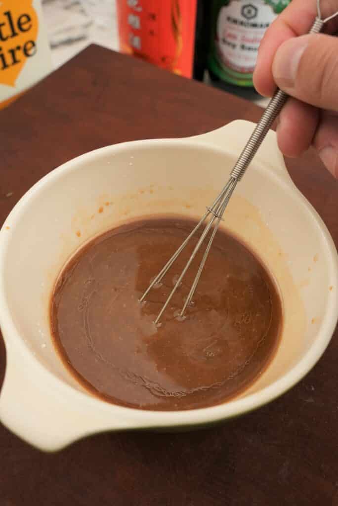 Mixing Sauce in a bowl