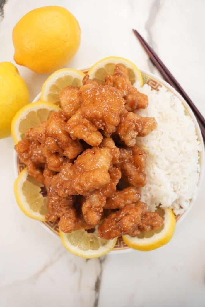 Chinese Lemon Chicken top down on a plate with rice