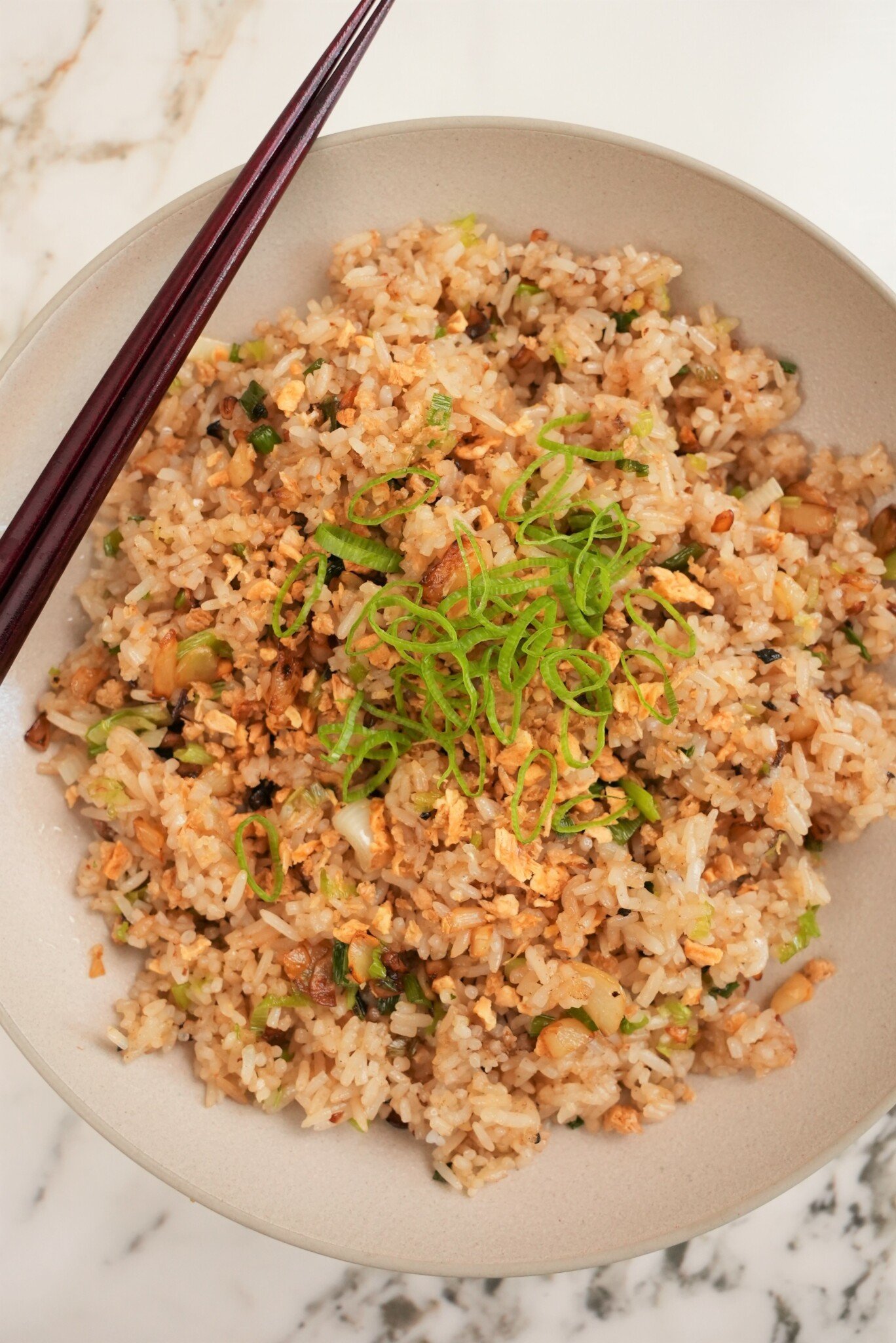 garlic fried rice plated in a bowl