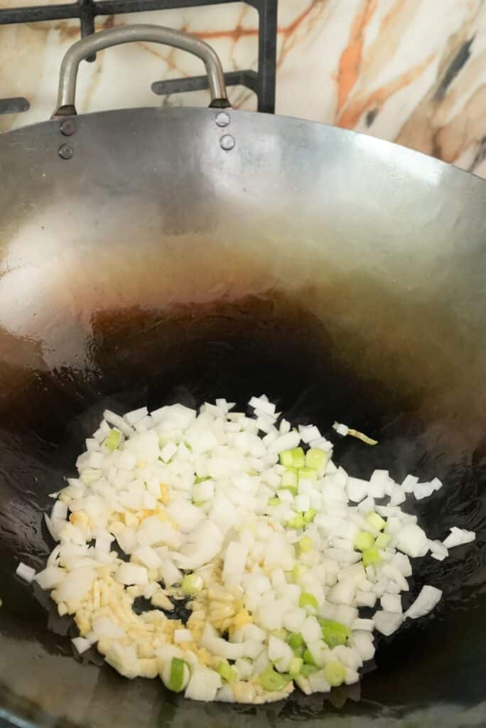 Frying aromatics in a wok