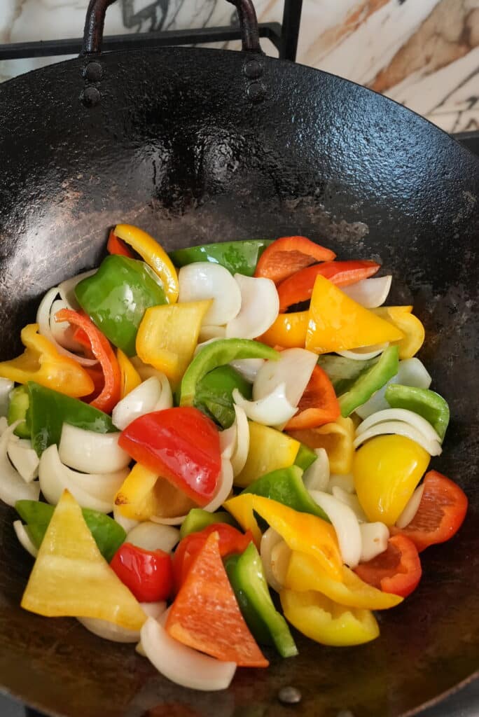 Cooking peppers in a wok