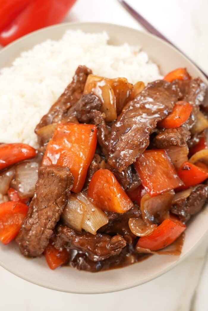 Black Pepper Beef close up on a bowl