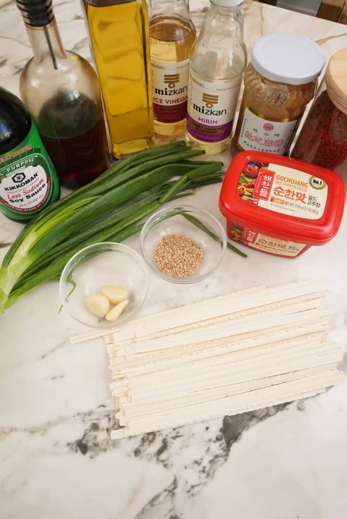 Raw ingredients for spicy gochujang noodles.