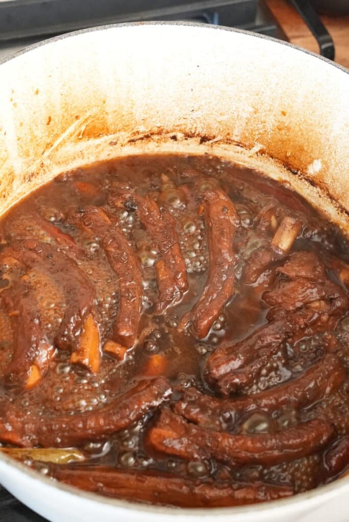 reducing braising liquid for sticky asian ribs