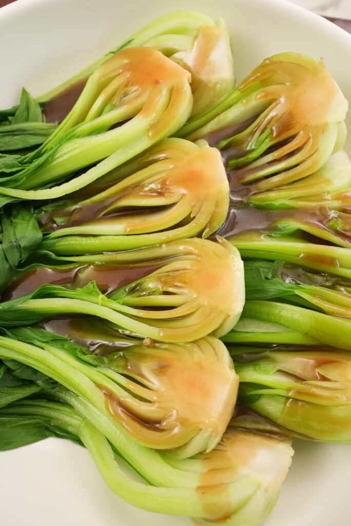 bok choy with oyster sauce on a plate