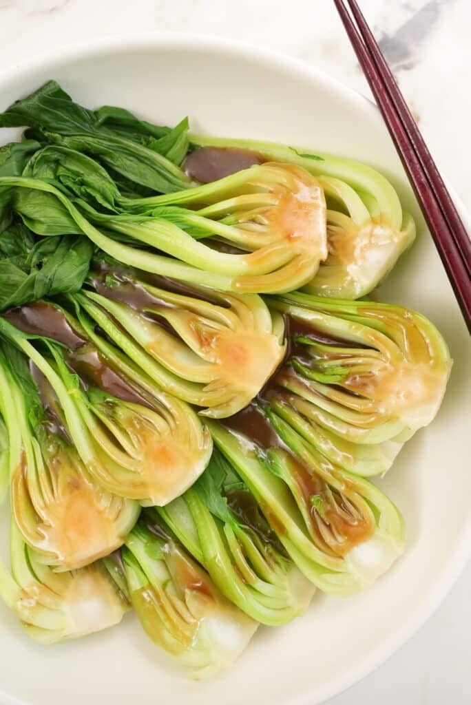 bok choy with oyster sauce on a plate