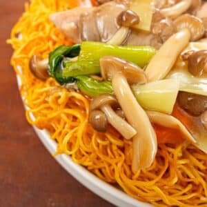 A plate of Chicken Chow Mein with Crispy Noodles on a plate.