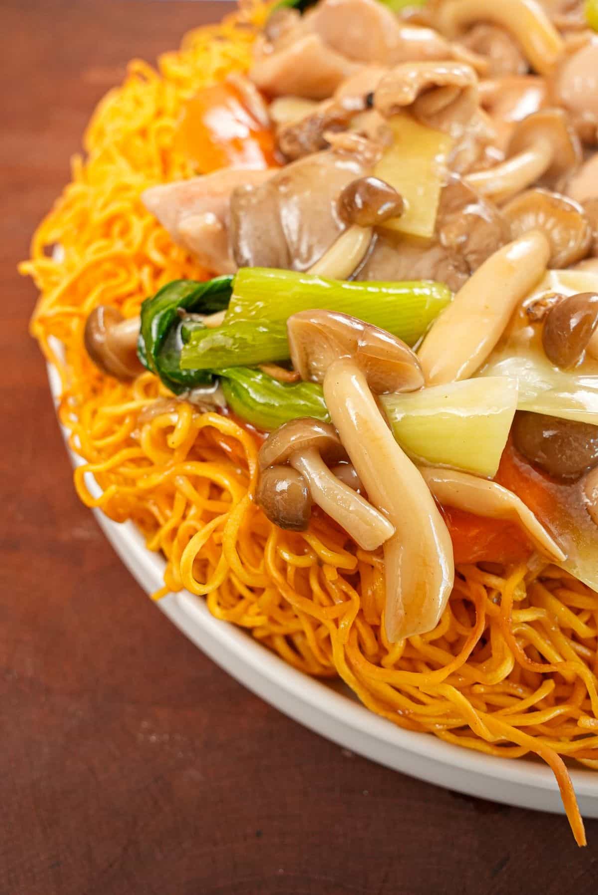 A plate of Chicken Chow Mein with Crispy Noodles on a plate.