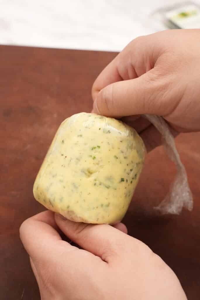 compound butter wrapped in plastic wrap
