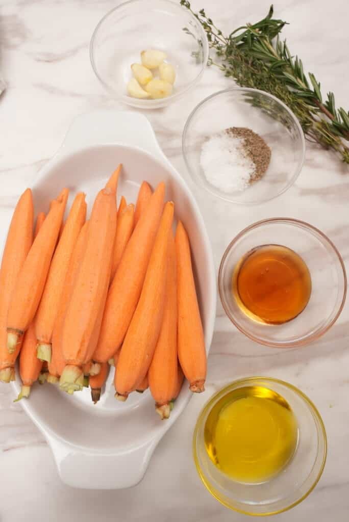 Raw ingredients for honey glazed carrots