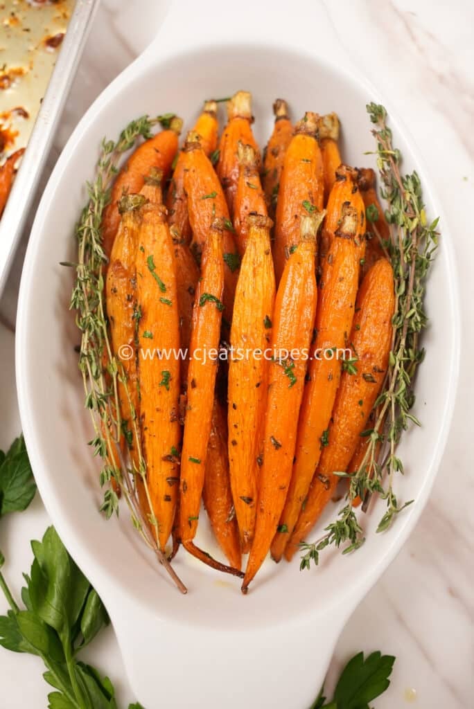 Honey roasted carrots in a baking dish.