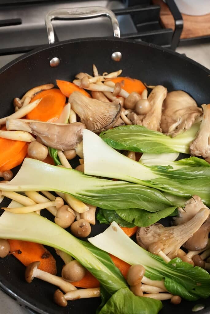 Cooking vegetables in a pan