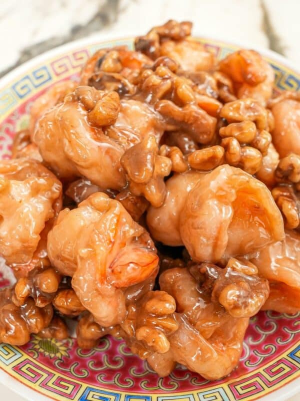 Honey Walnut Shrimp on a plate with candied walnuts.