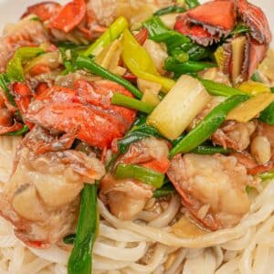 Chinese Lobster noodles (Lobster Yee Mein) in a large white bowl.
