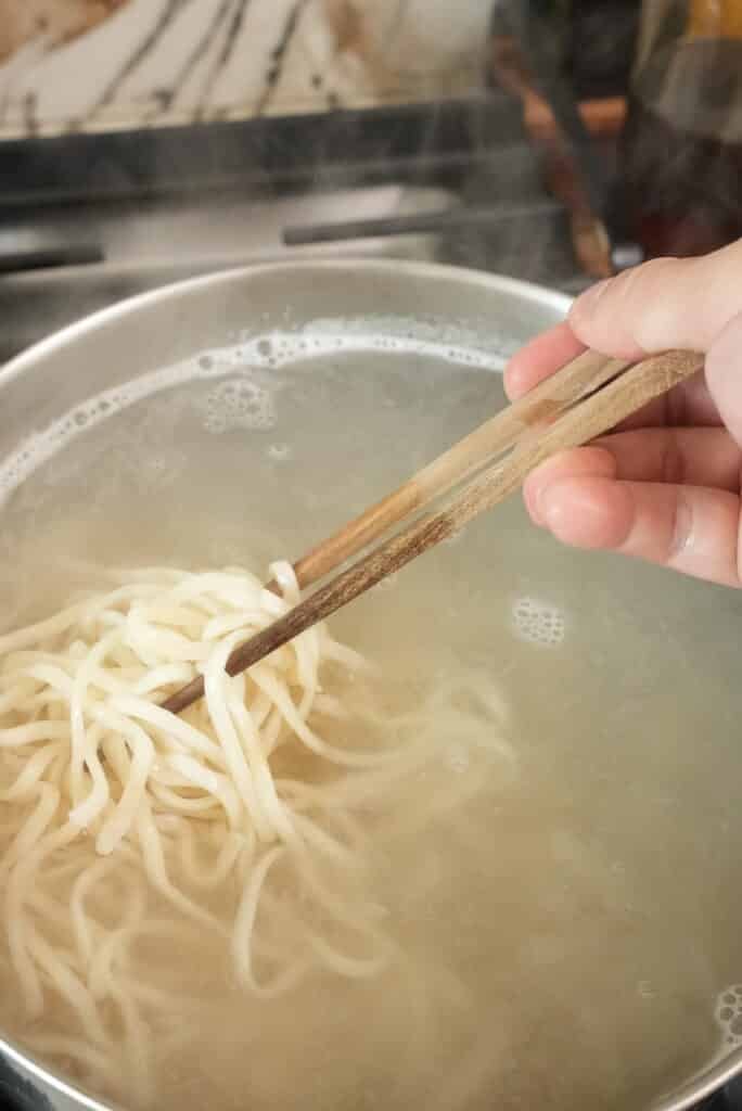 noodles cooking in boiling water