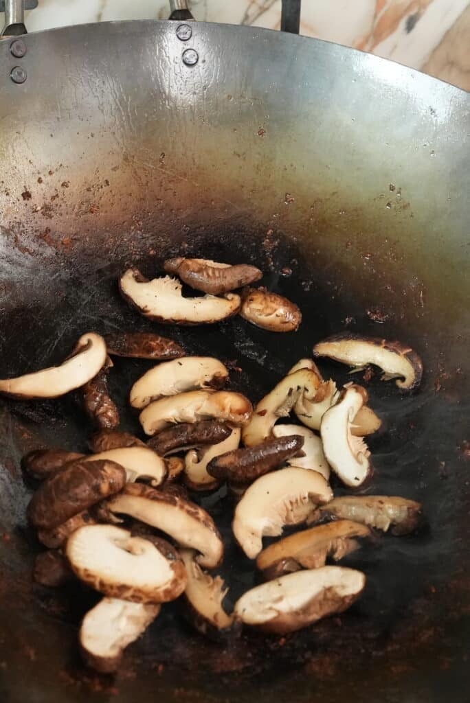 Sauteed mushrooms in a wok