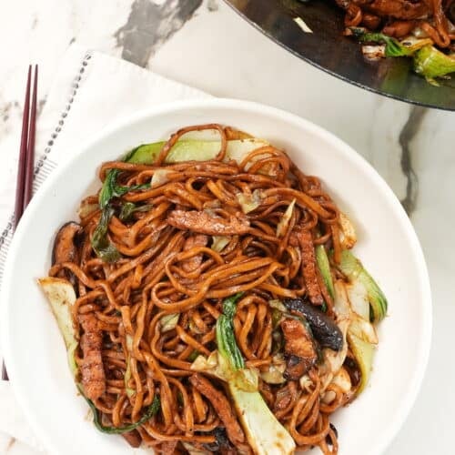 Shanghai Fried Noodles on a plate with wok