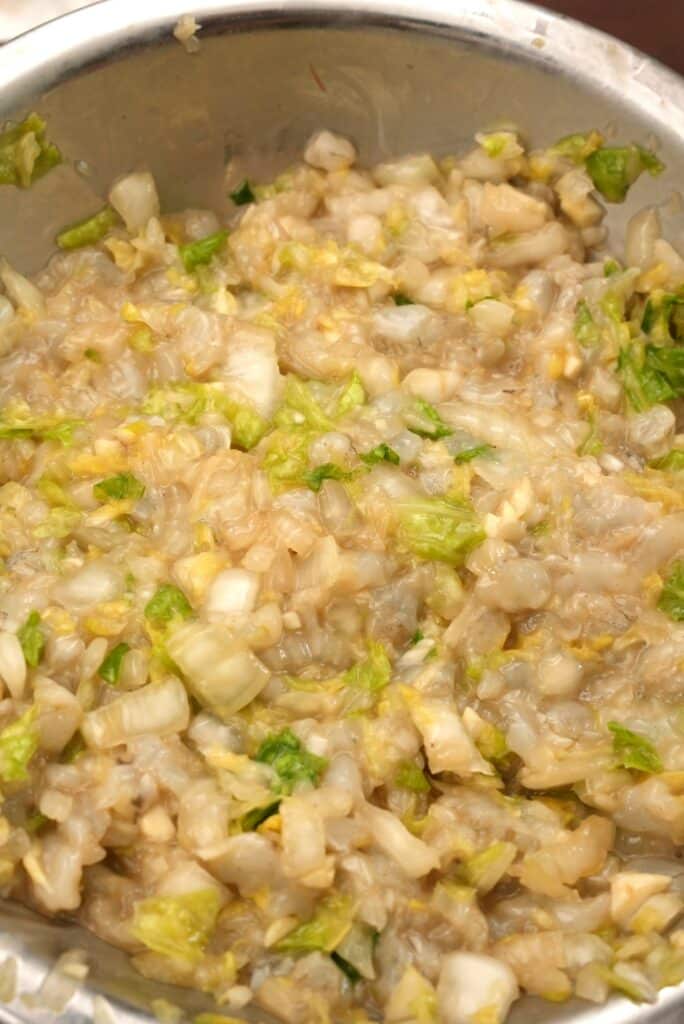 Shrimp and cabbage filling mixed in a bowl