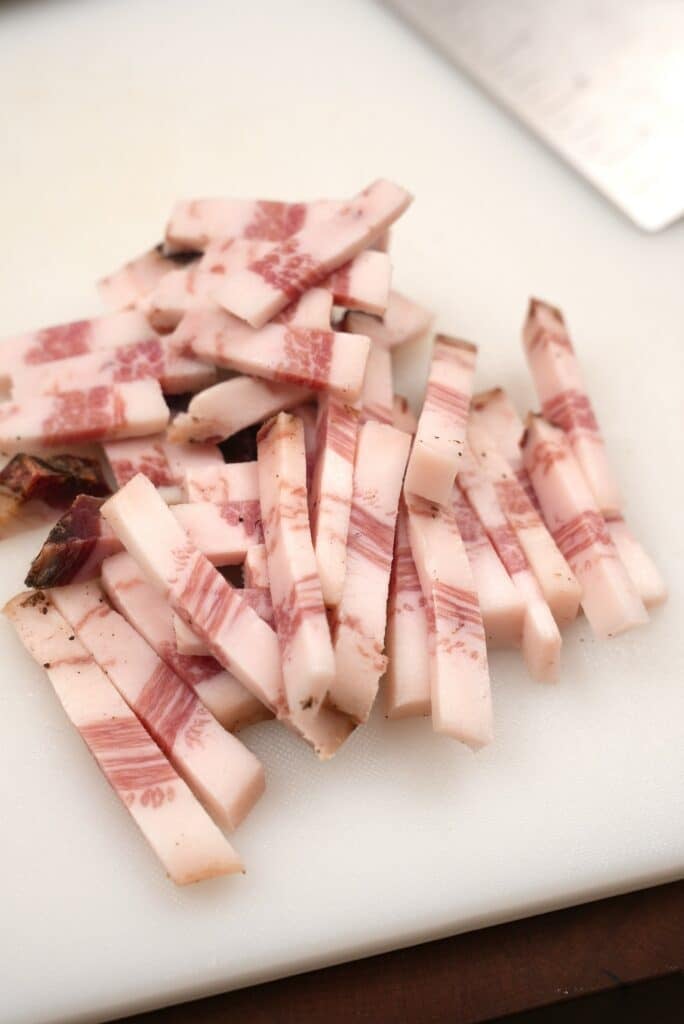 Cured pork jowl cut into strips
