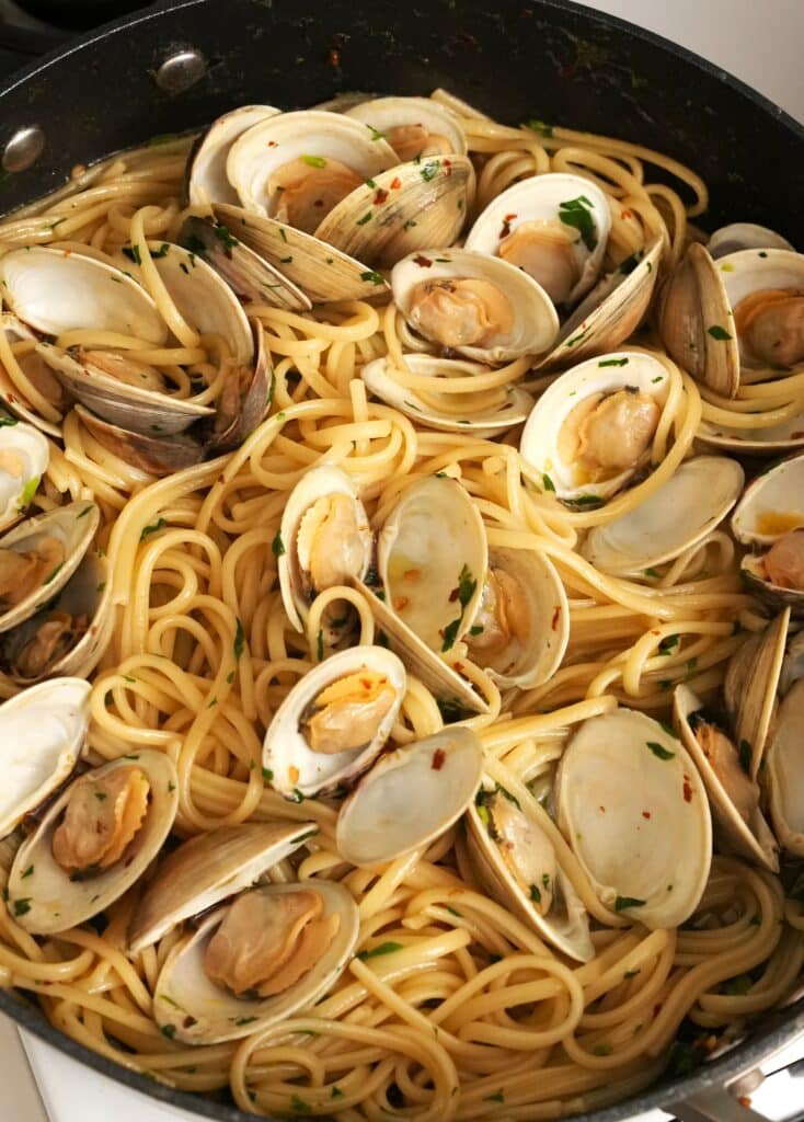 Linguine and clams finished in a pan
