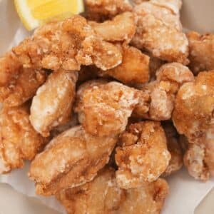 Chicken Karaage (Japanese Fried Chicken) in a bowl with a lemon wedge.