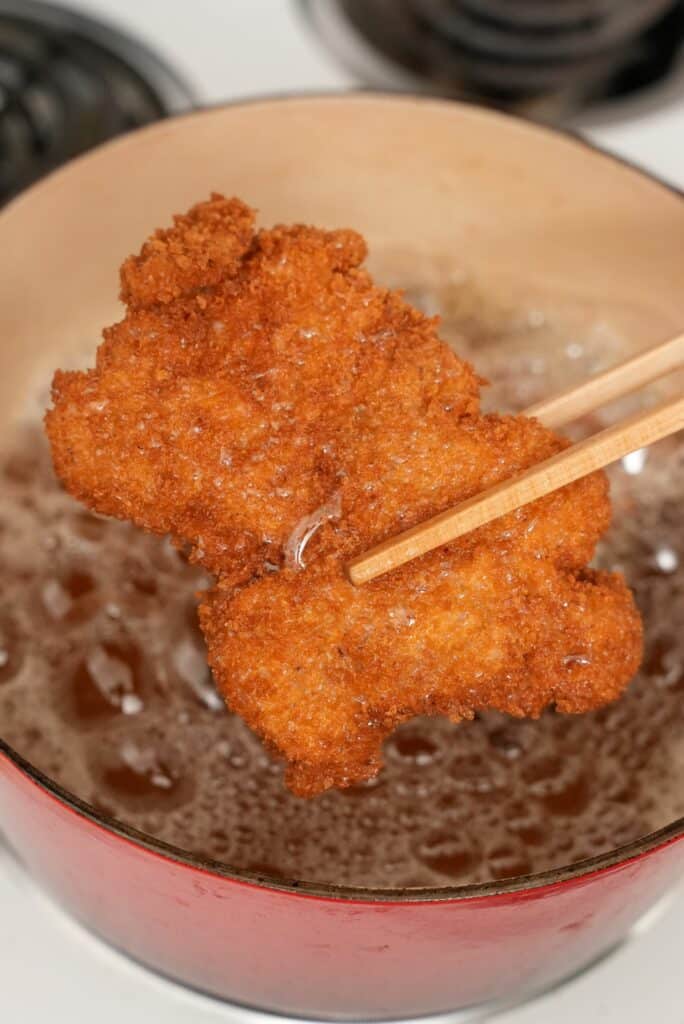 Crispy chicken katsu in a deep fryer