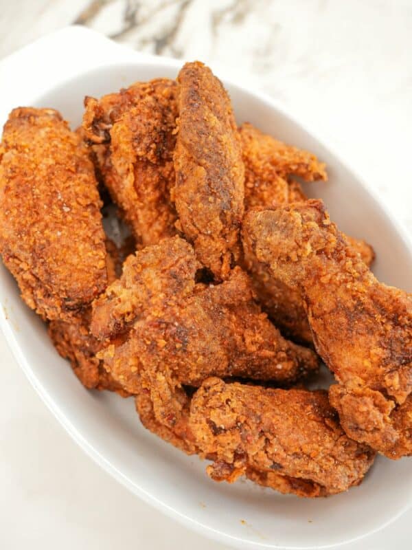 Crispy Five Spice Chicken Wings on a white tray.