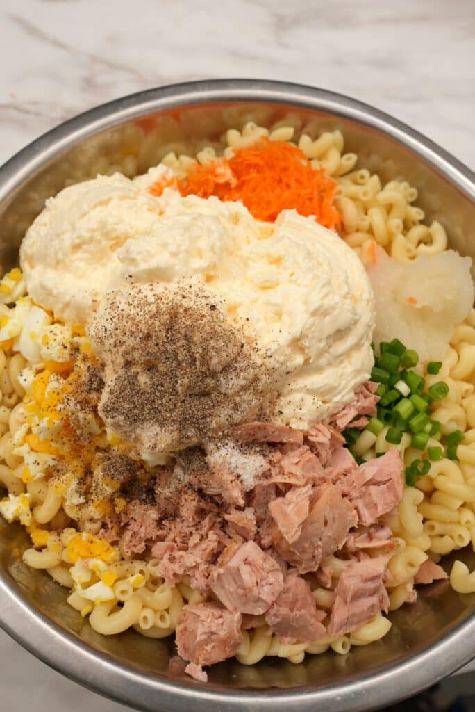 Ingredients for Hawaiian macaroni salad in a bowl